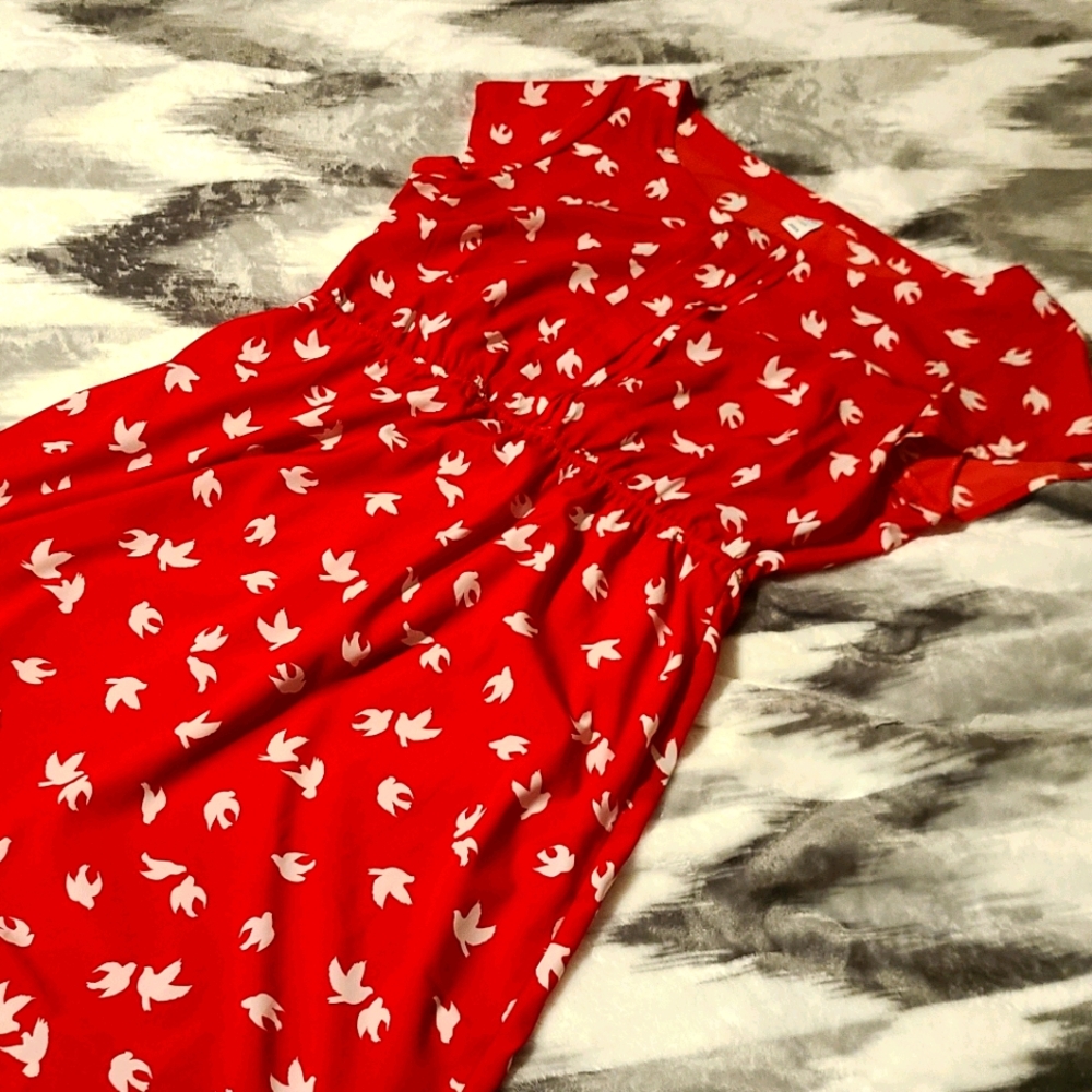 Beautiful red dress with white doves